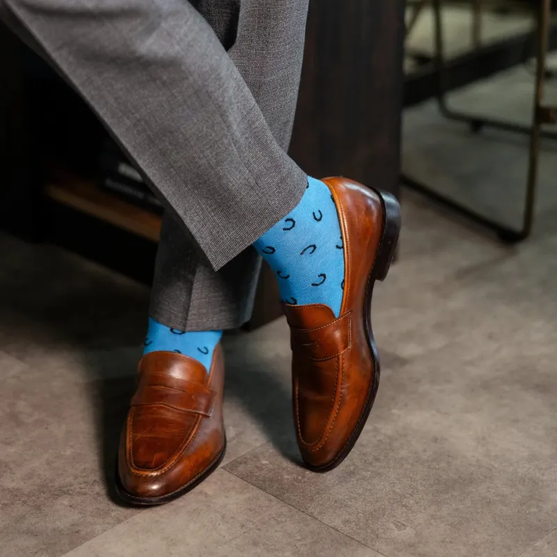 The Penchins - A Sky Blue Sock with Black Horseshoes made by Southern Scholar