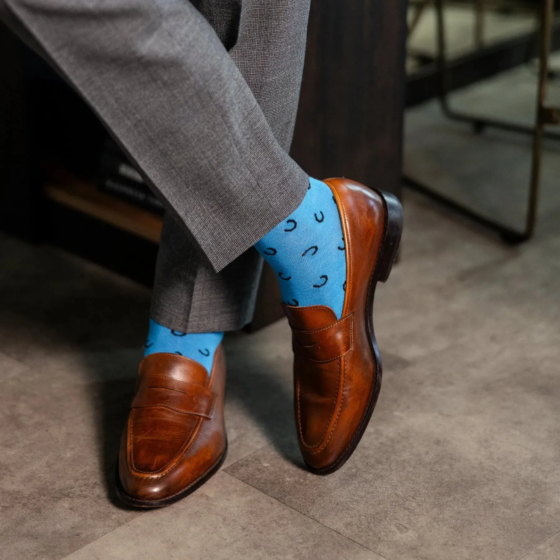 The Penchins - A Sky Blue Sock with Black Horseshoes sold by Southern Scholar