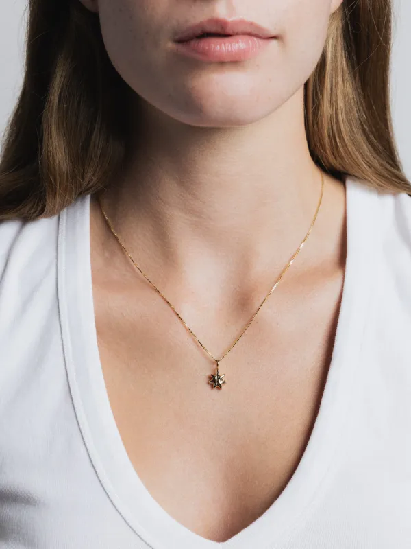 Sun Charm Necklace in Gold sold by Wolf Circus