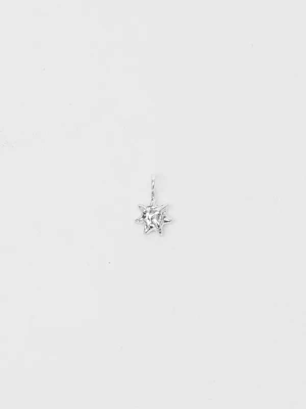 Sun Charm in Sterling Silver sold by Wolf Circus