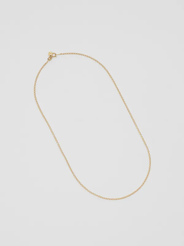 Elongated Curb Chain in Gold sold by Wolf Circus