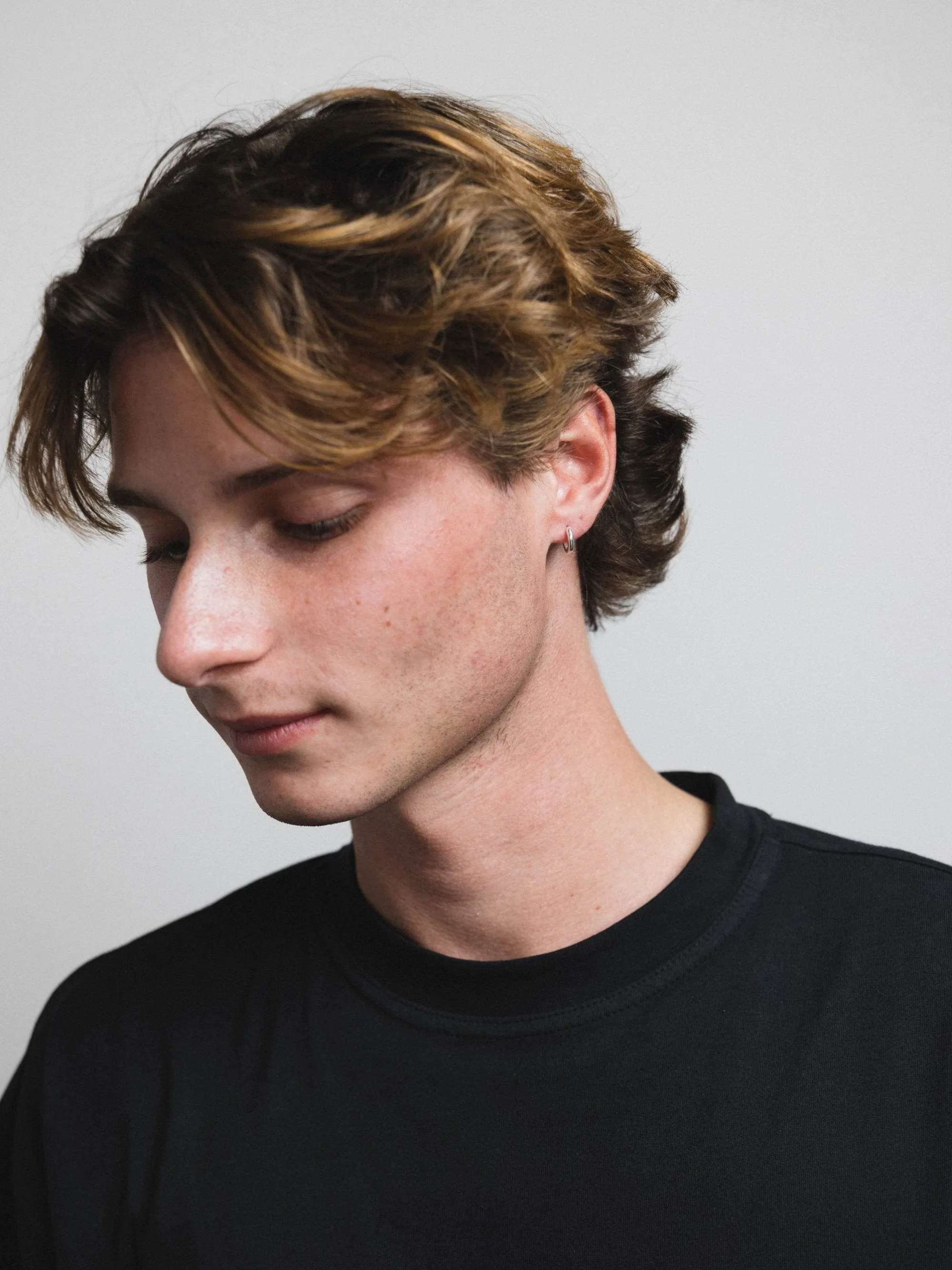 Huggie Hoops in Sterling Silver sold by Wolf Circus product image thumbnail 2