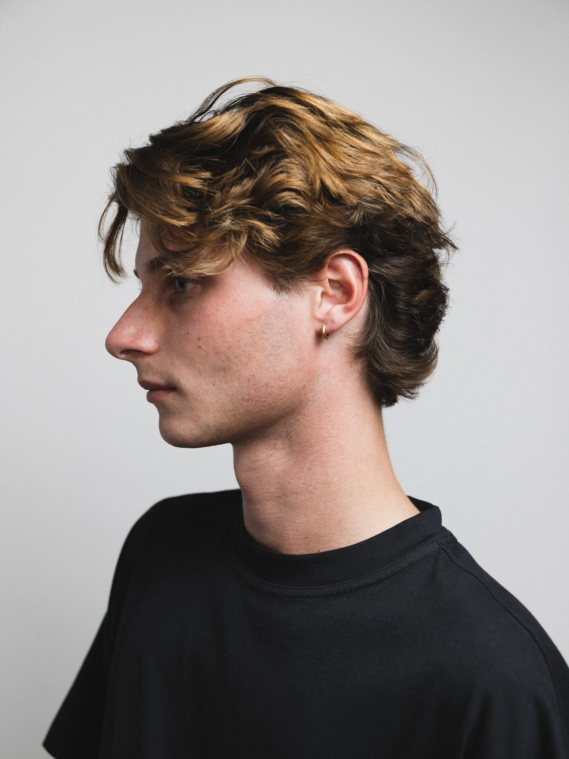 Huggie Hoops in Gold sold by Wolf Circus product image thumbnail 2