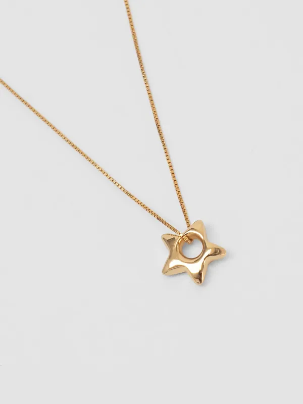 Star Charm Necklace in Gold sold by Wolf Circus