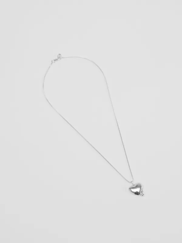 Pierced Heart Necklace in Sterling Silver made by Wolf Circus