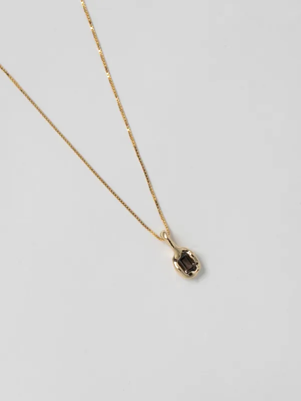Uma Necklace in Smoke Quartz and Gold sold by Wolf Circus
