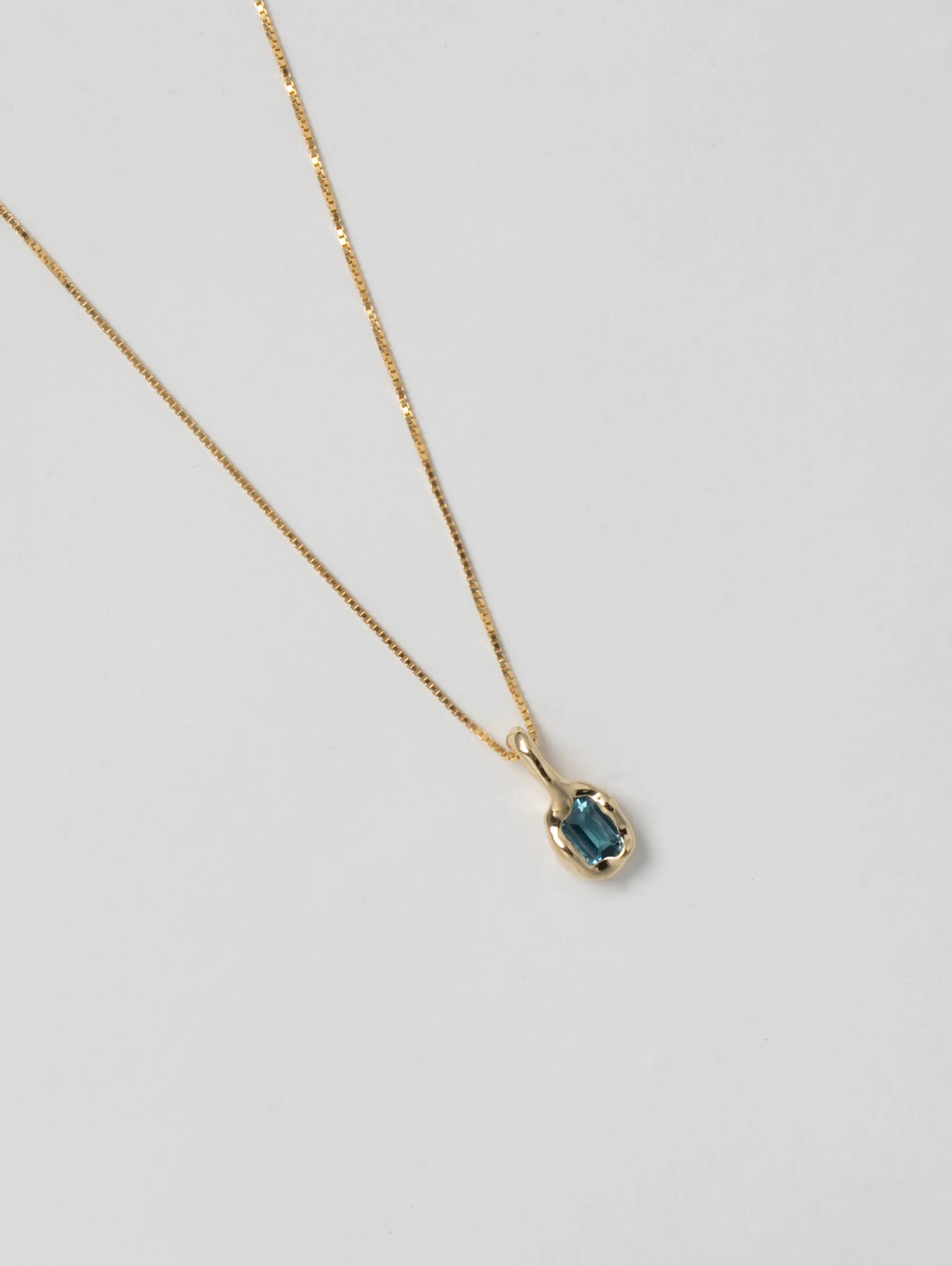 Uma Necklace in Blue Topaz and Gold sold by Wolf Circus