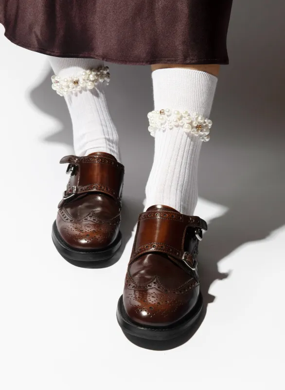 Miami sold by Maria La Rosa