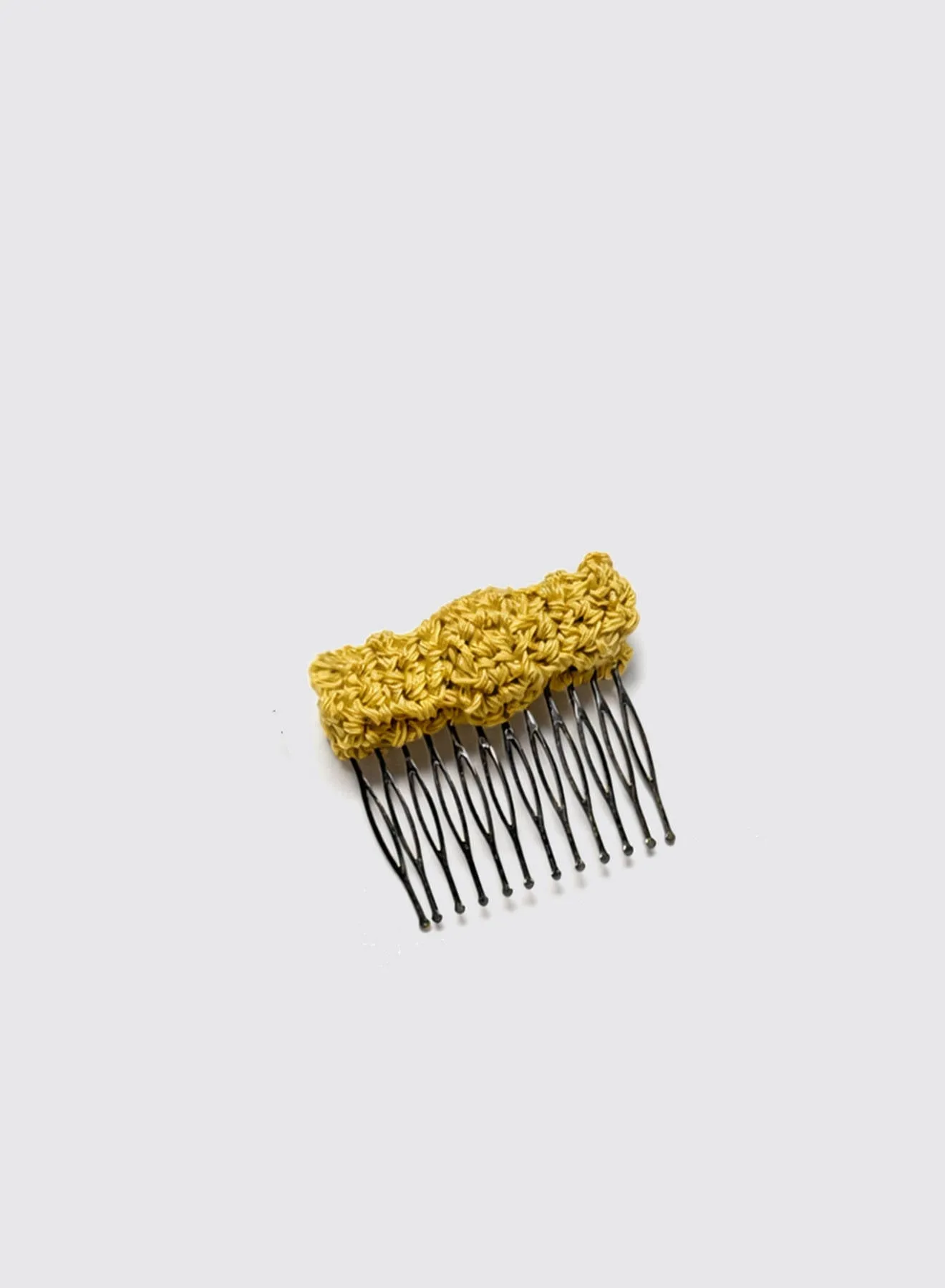Bow Comb sold by Maria La Rosa