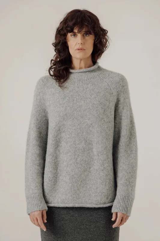 Handloom Rollneck Sweater in Chambray sold by Bare Knitwear