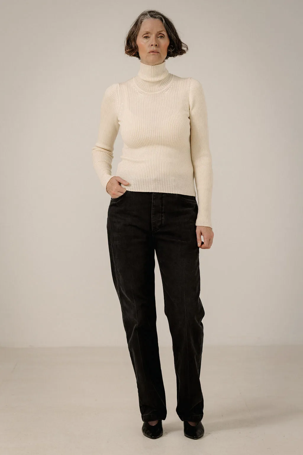 Fine Merino Turtleneck in Ivory sold by Bare Knitwear