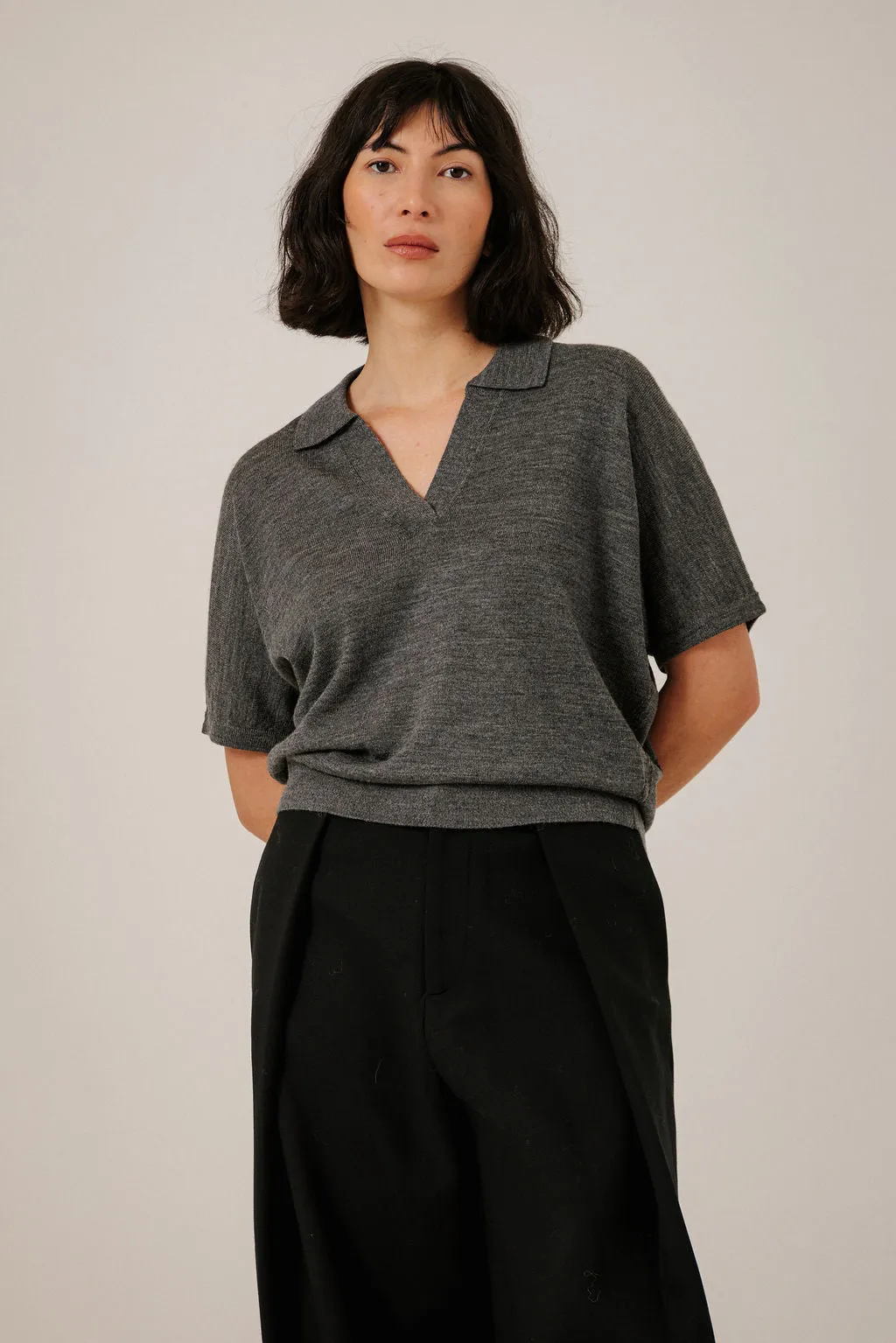 Batwing Merino Polo in Charcoal sold by Bare Knitwear