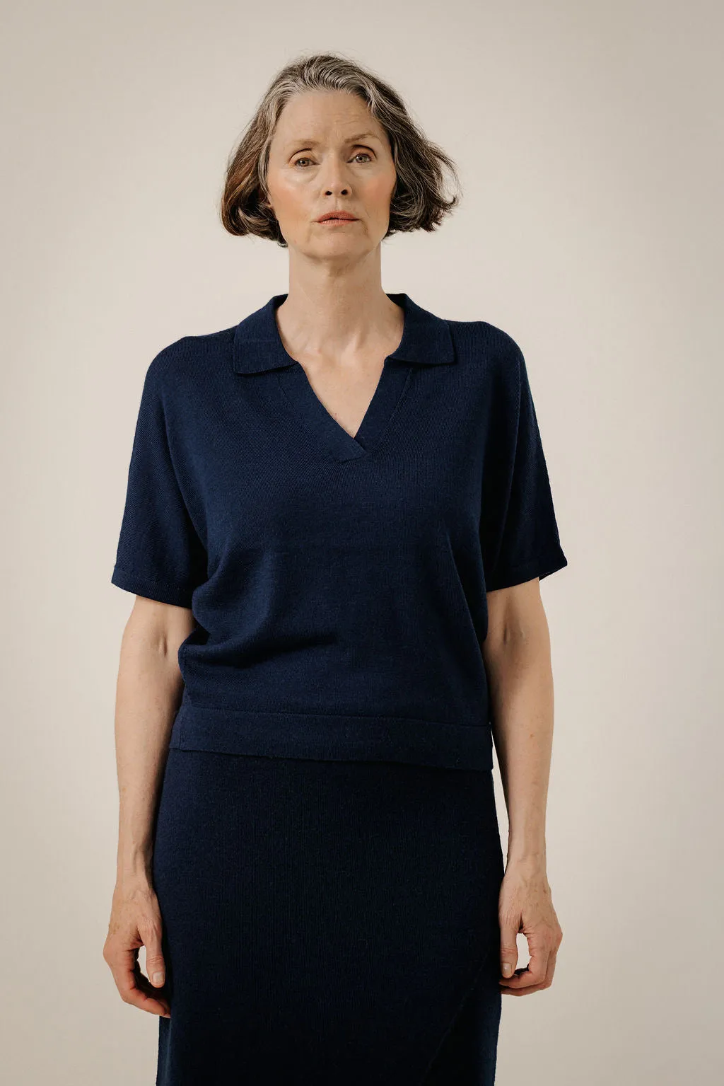 Batwing Merino Polo in Navy sold by Bare Knitwear