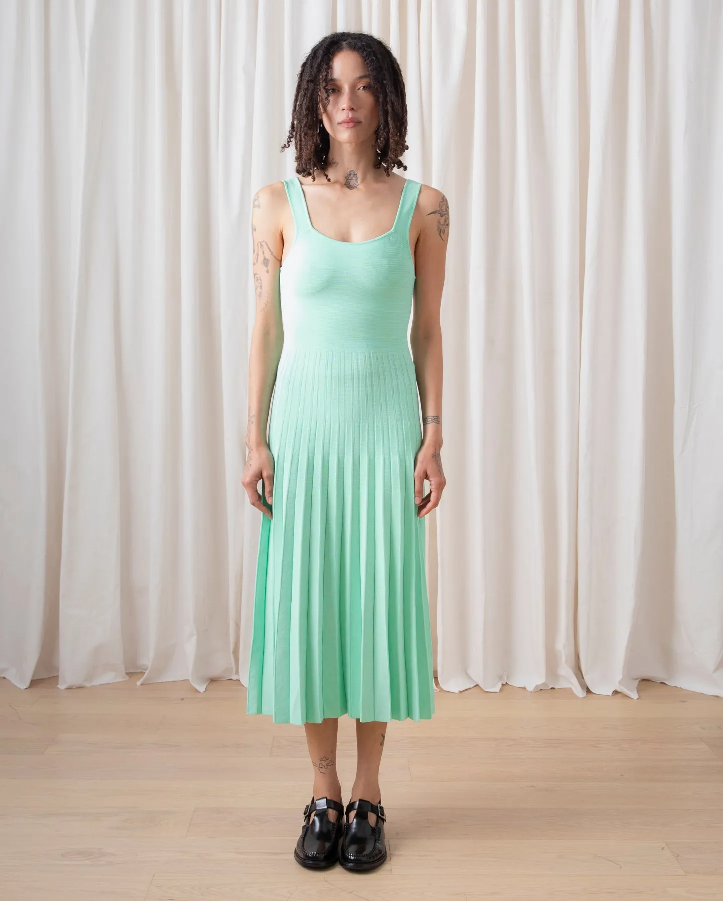 FITTED TANK DRESS W/ PLEATED SKIRT - BLACK sold by Ali Golden product image thumbnail 2