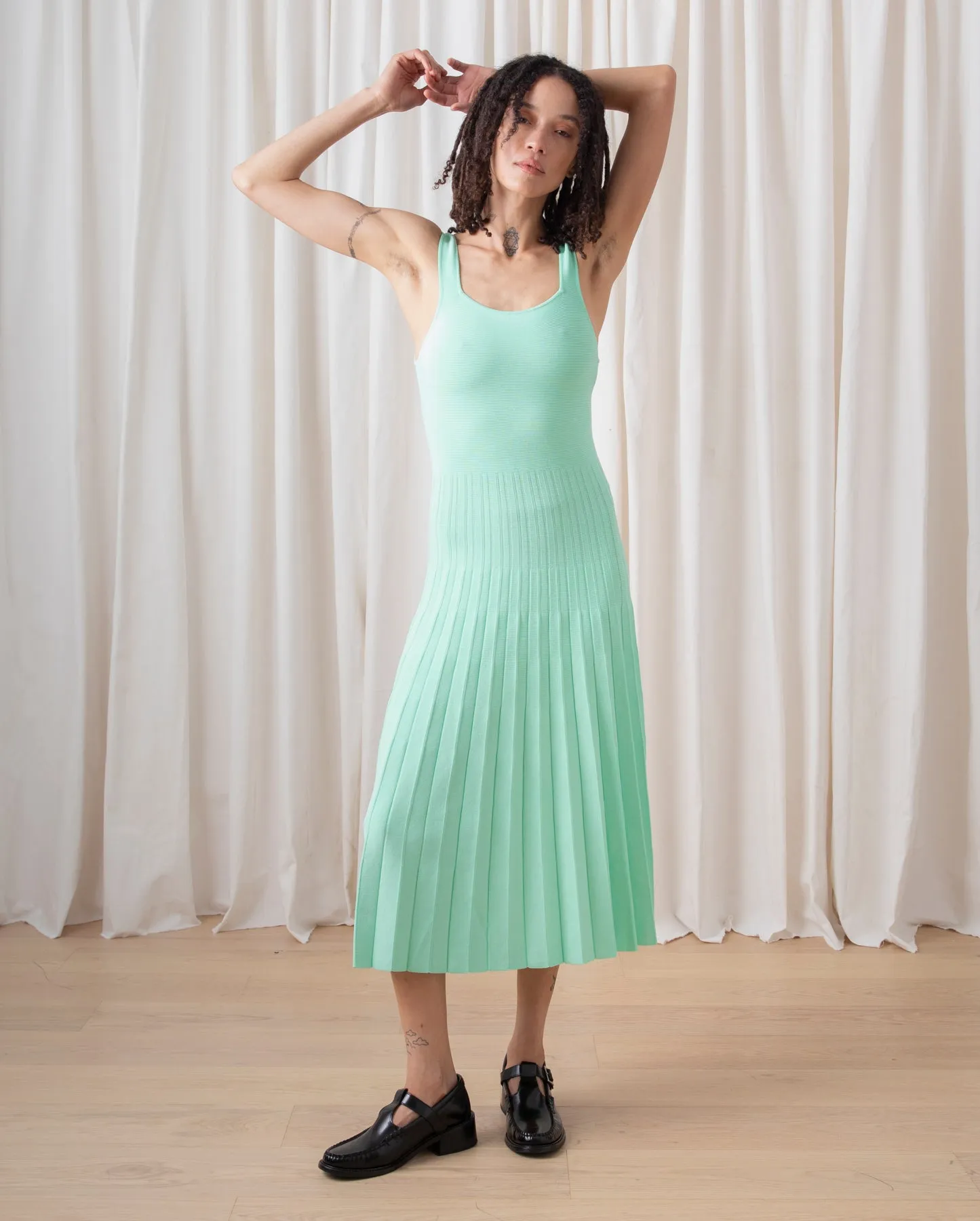 FITTED TANK DRESS W/ PLEATED SKIRT - BLACK sold by Ali Golden product image thumbnail 3