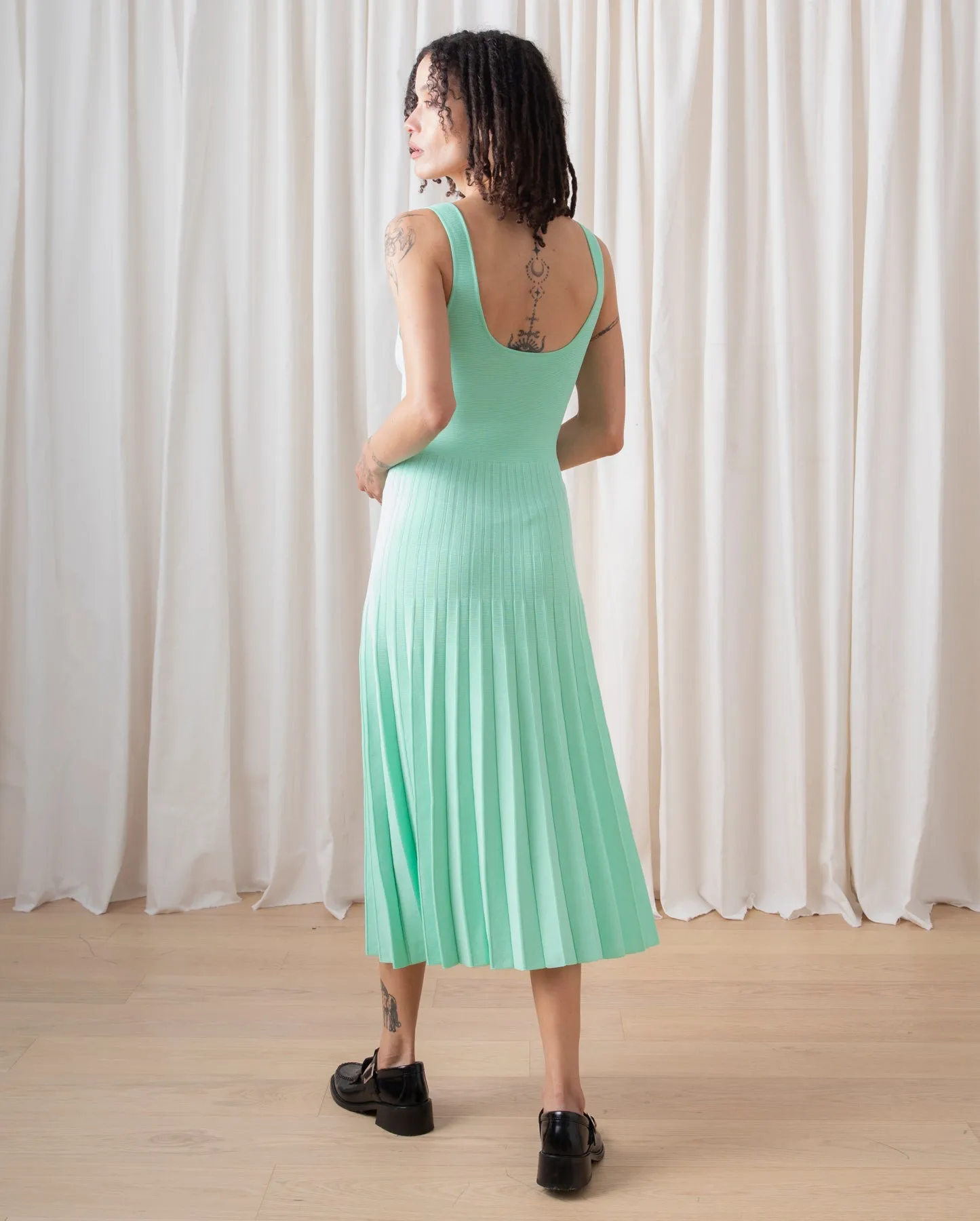 FITTED TANK DRESS W/ PLEATED SKIRT - BLACK sold by Ali Golden product image thumbnail 5