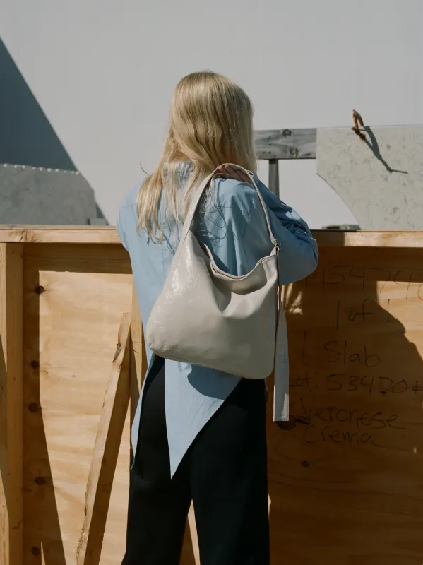 Jane in Crinkle Patent sold by Are Studio