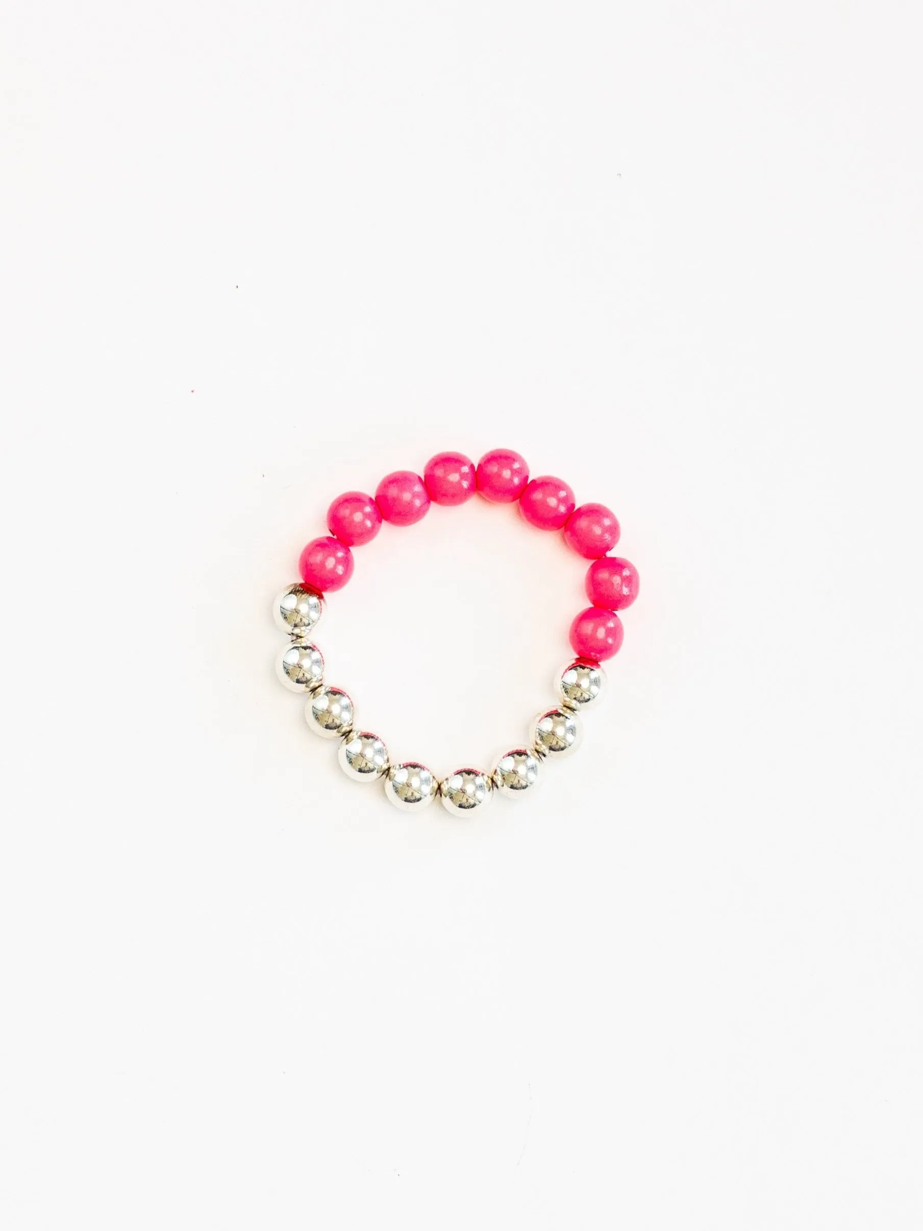 Perlen silver/wood bracelet, neonpink sold by Ina.seifart