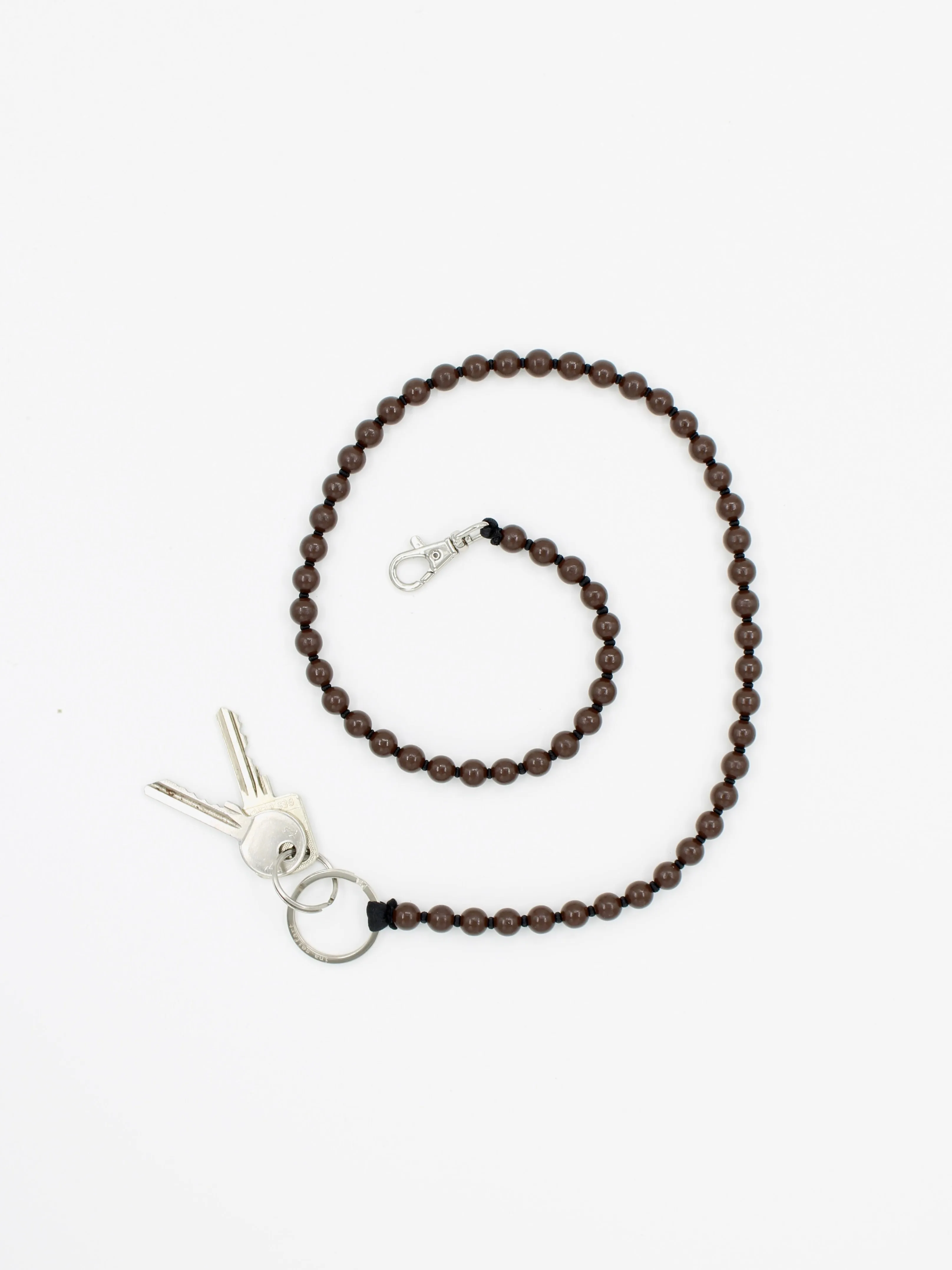 Perlen long, brown-black sold by Ina.seifart