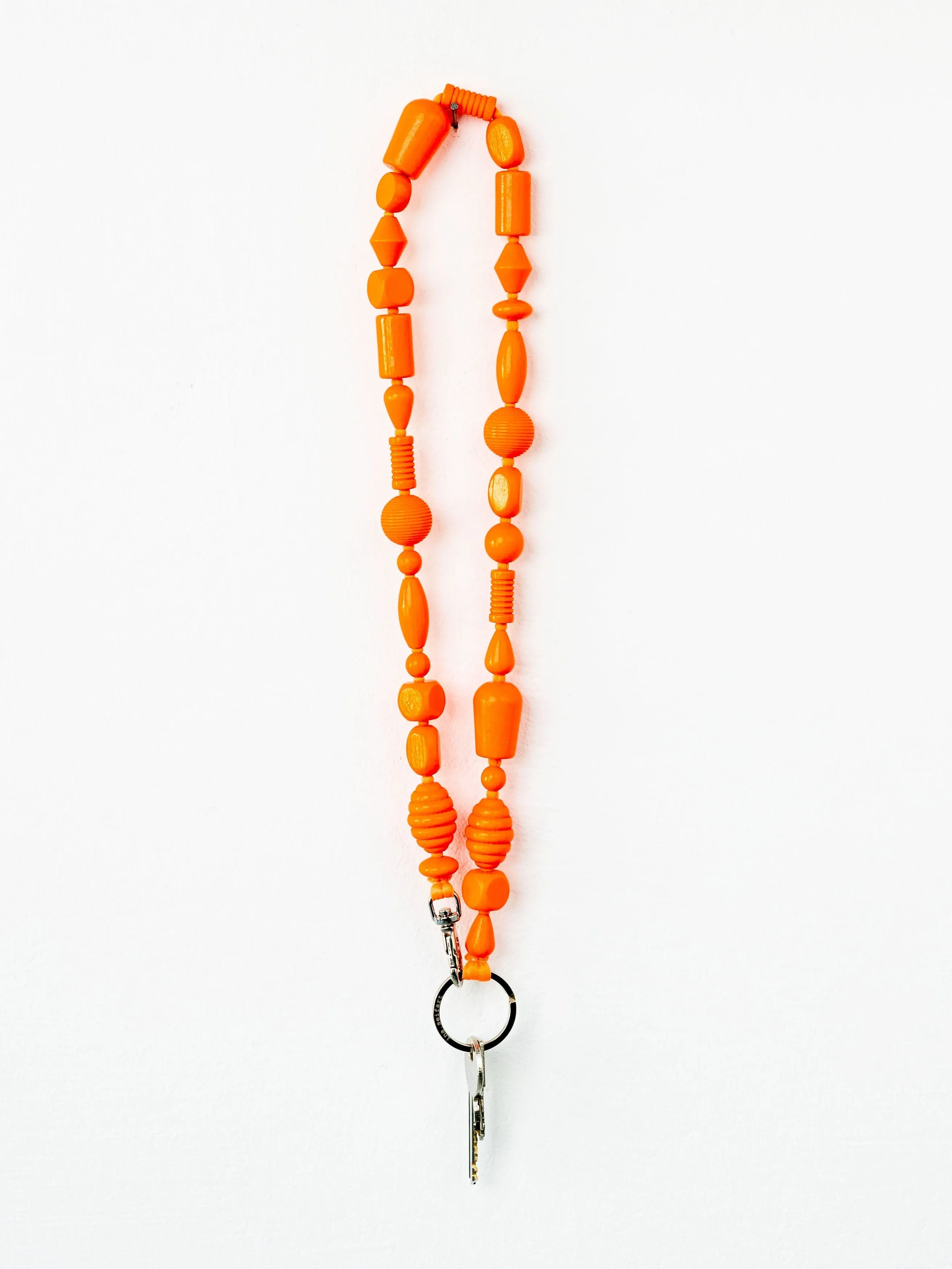 Perlenmix long, neonorange sold by Ina.seifart