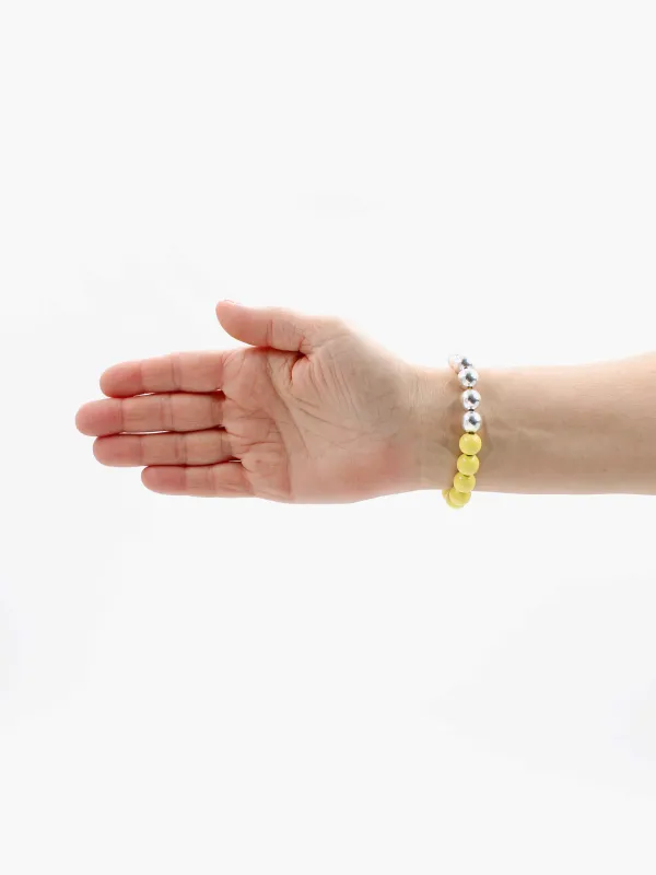 Perlen silver/wood bracelet, pastelyellow made by Ina.seifart