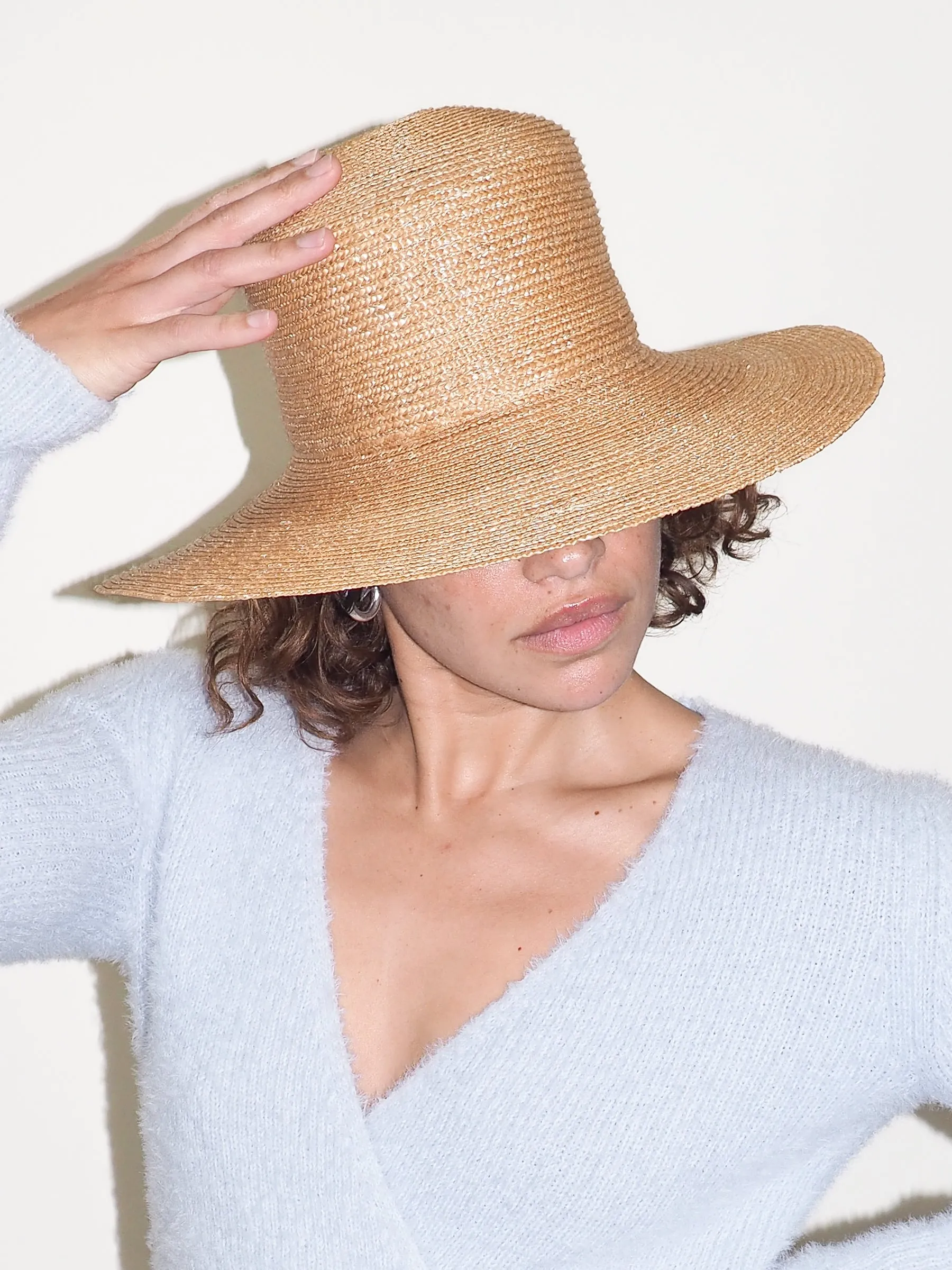 Medium Brim Flat Top Hat in Sand Straw sold by CLYDE