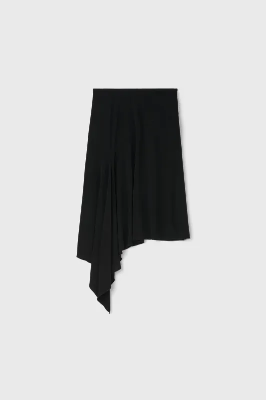 The Rimini asymmetric jersey skirt made by Rodebjer