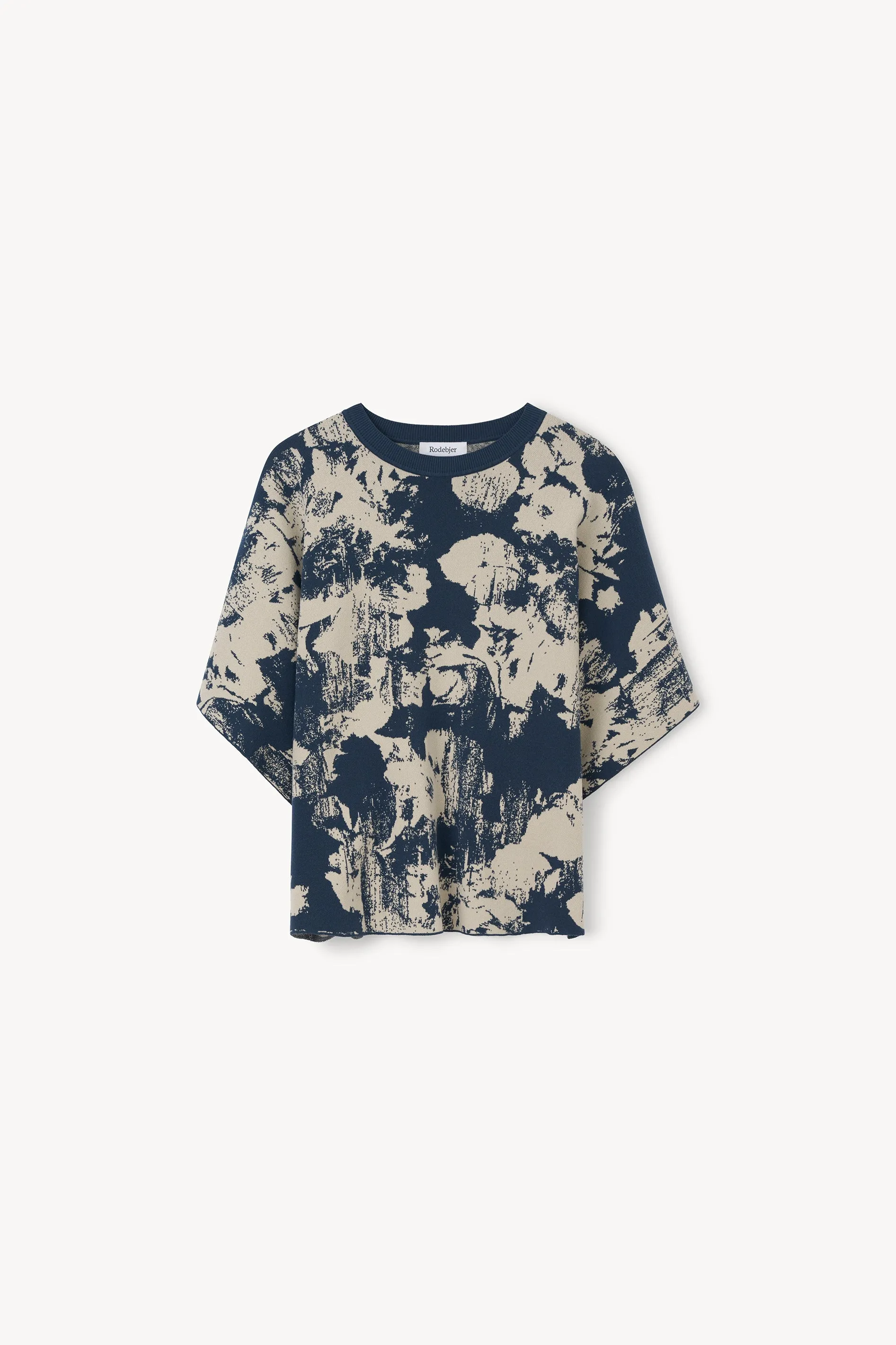 The Poppi denim flower top sold by Rodebjer