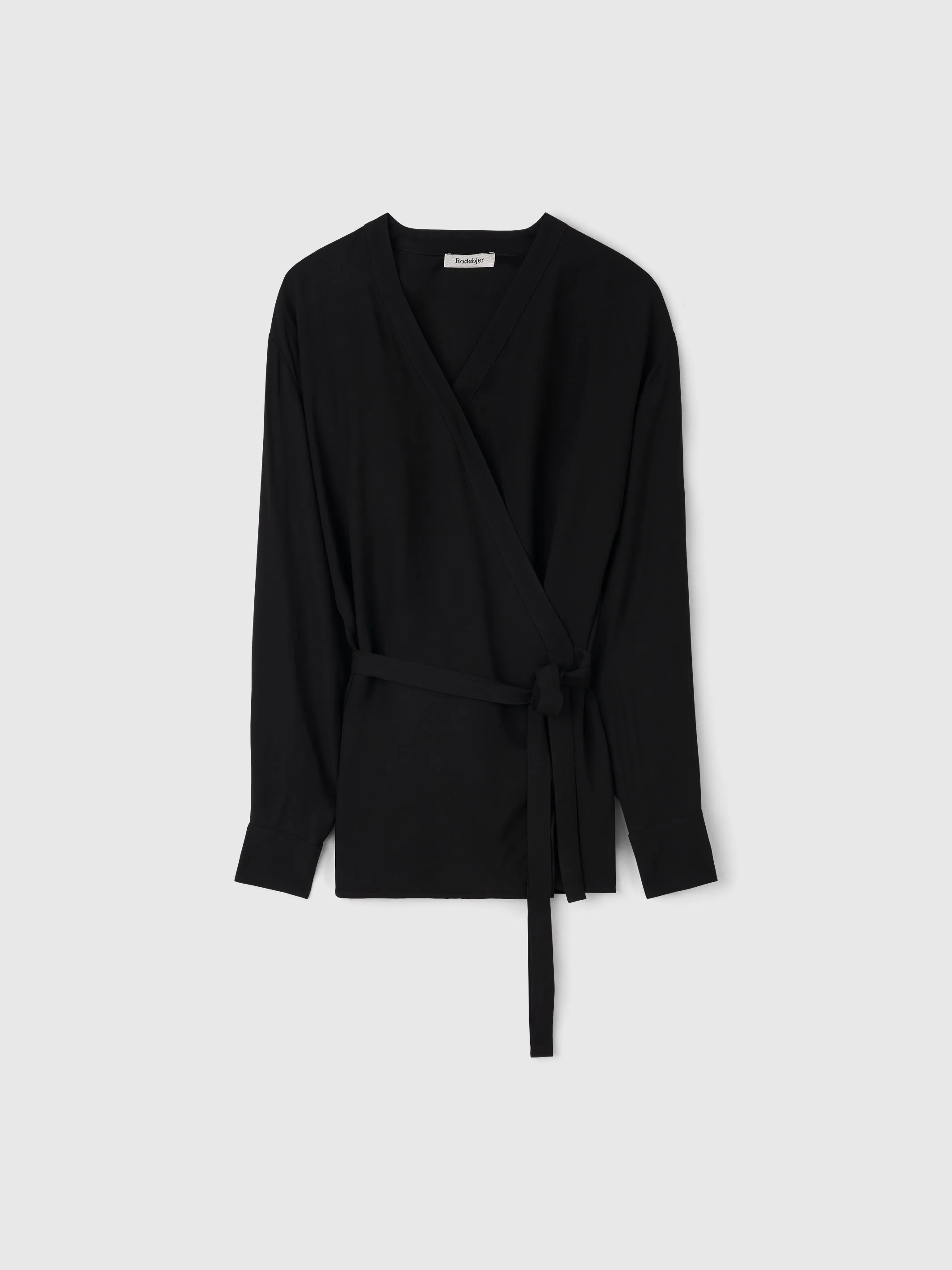 The Palmer wrap blouse sold by Rodebjer