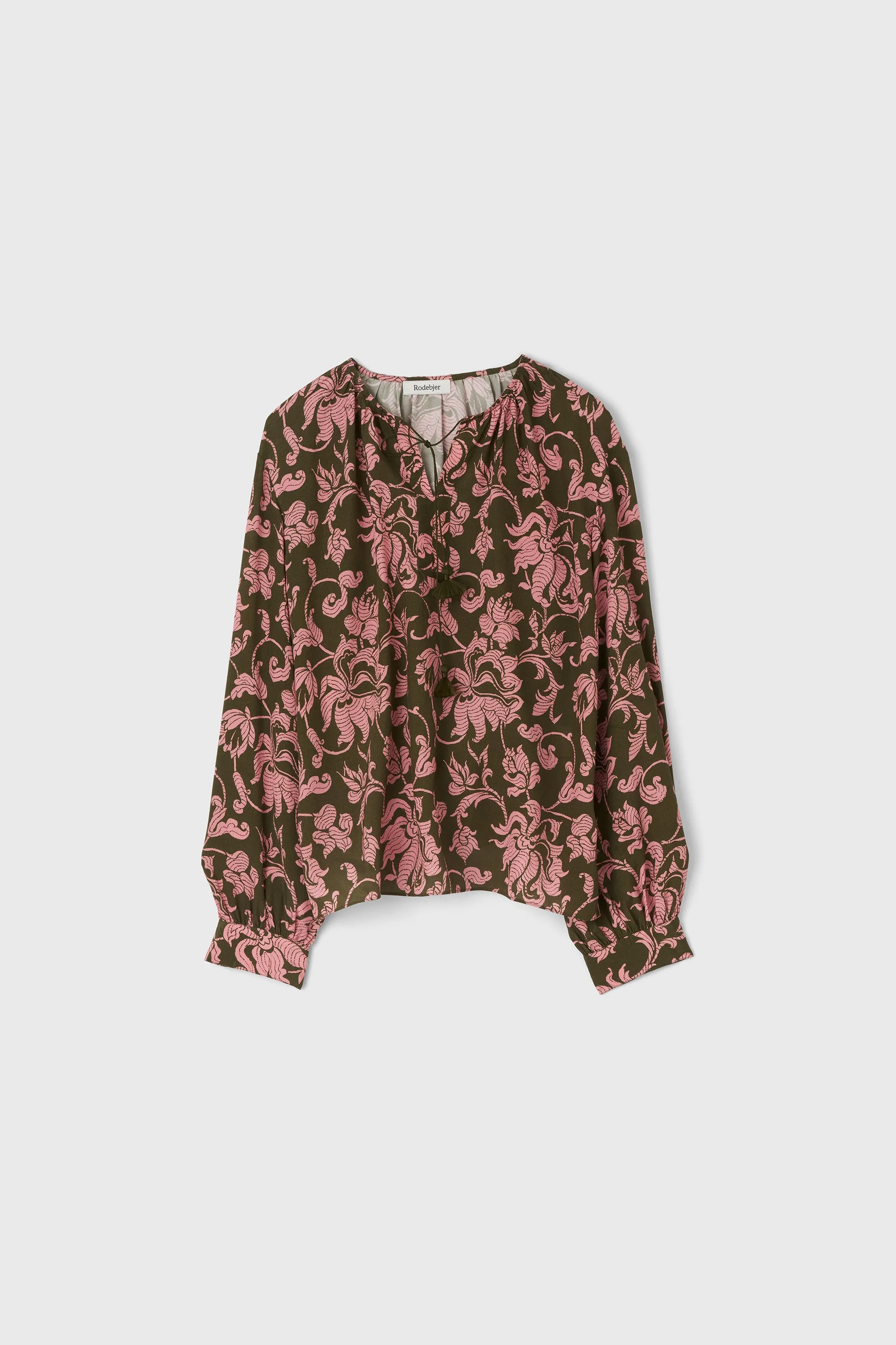 The Baily raglan blouse in French Lily sold by Rodebjer