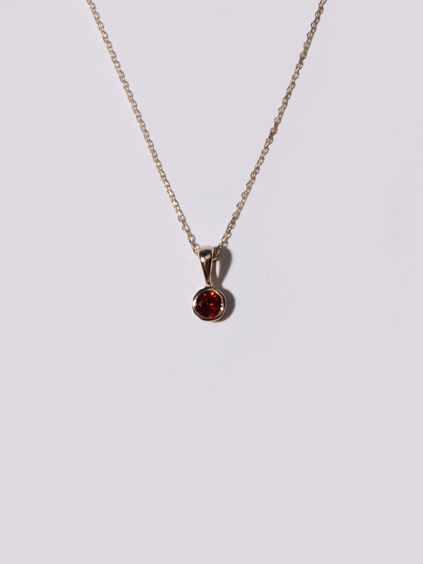 Garnet Bezel Pendant sold by Loren Stewart