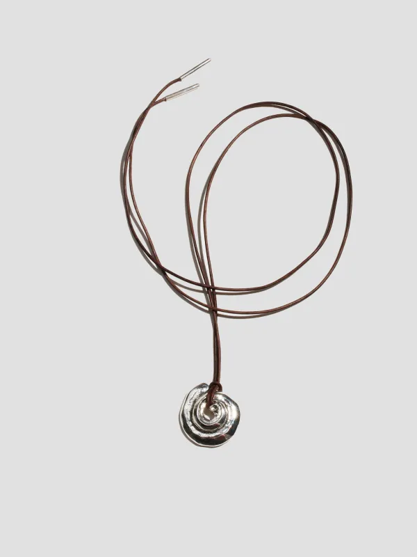 Tumbled Shell on Cord made by Loren Stewart