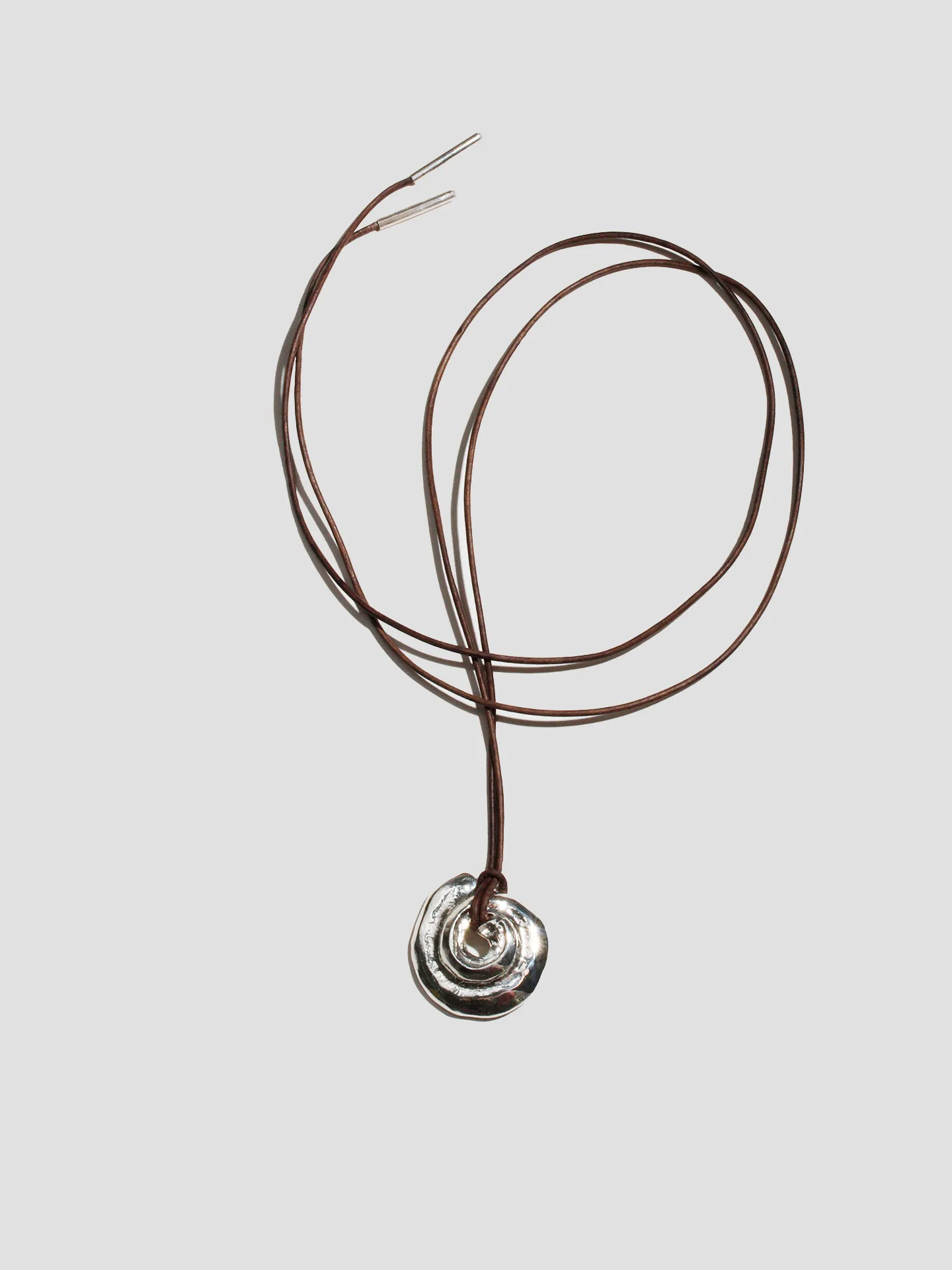 Tumbled Shell on Cord sold by Loren Stewart