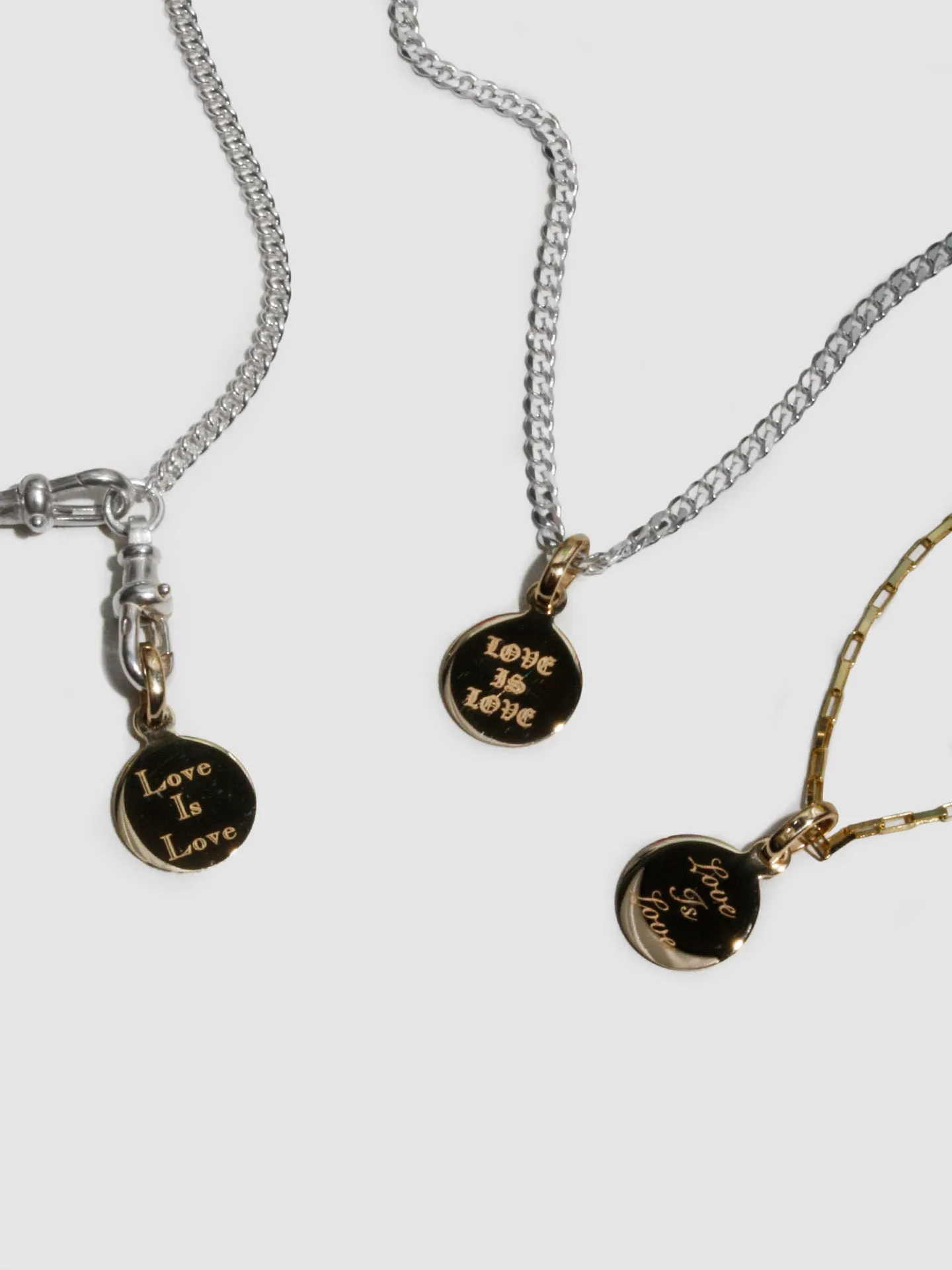 'Love Is Love' Mini Disk Pendant sold by Loren Stewart product image thumbnail 2