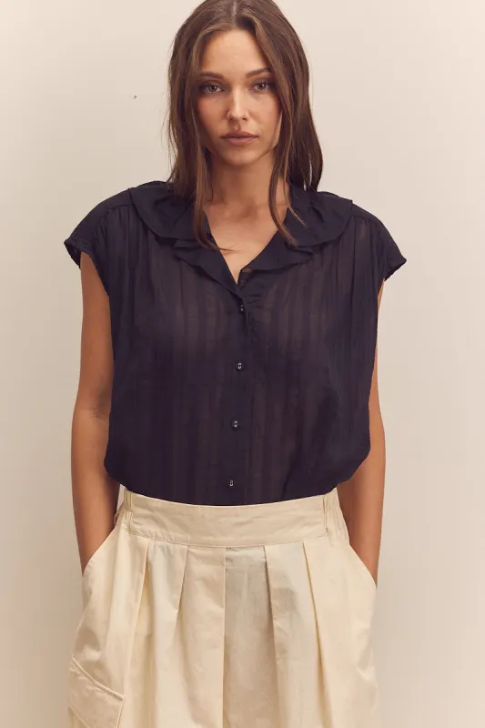 Ruffled collar blouse sold by amente