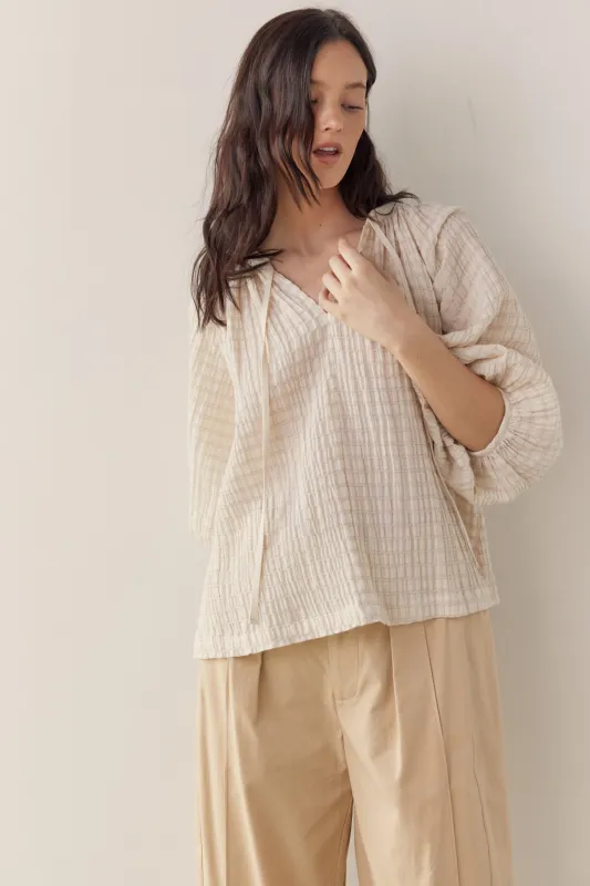 Textured peasant blouse sold by amente