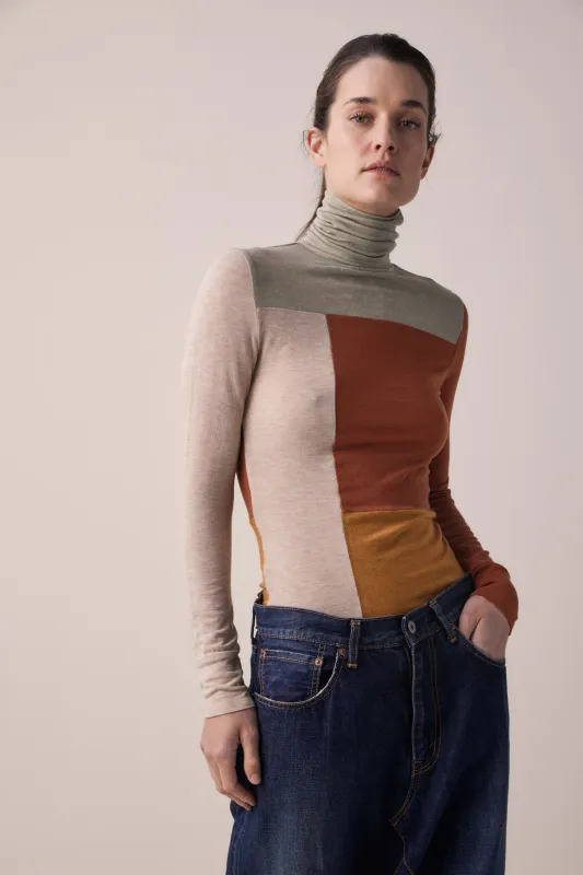 Color block lightweight knit turtleneck sold by amente