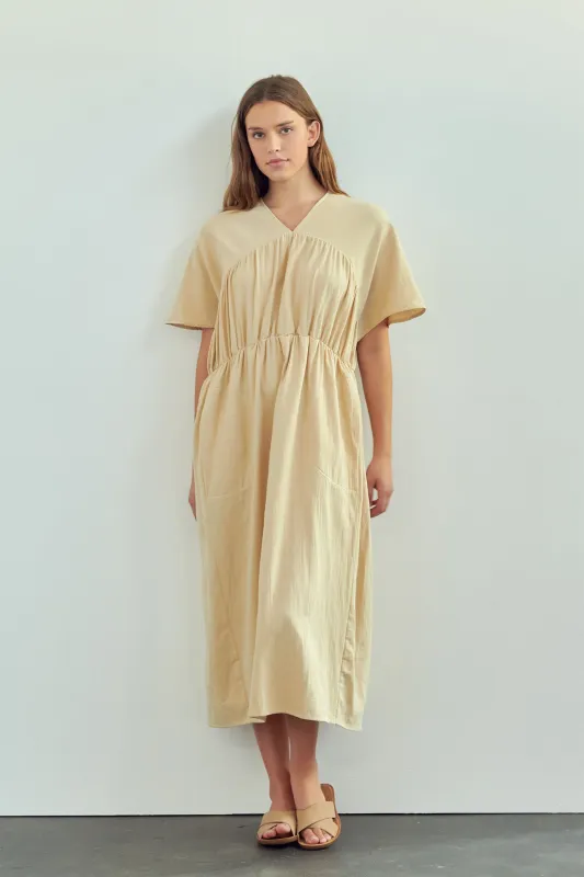 Drop sleeve front shirred midi dress sold by amente