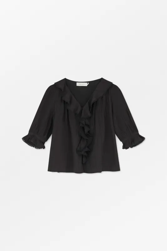Clea blouse - Black sold by Skall Studio