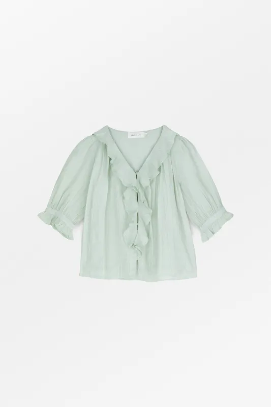 Clea blouse - Light aqua sold by Skall Studio