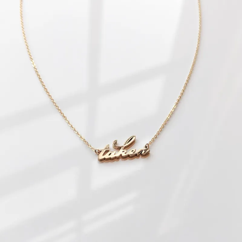 Taken Script Necklace made by Thatch