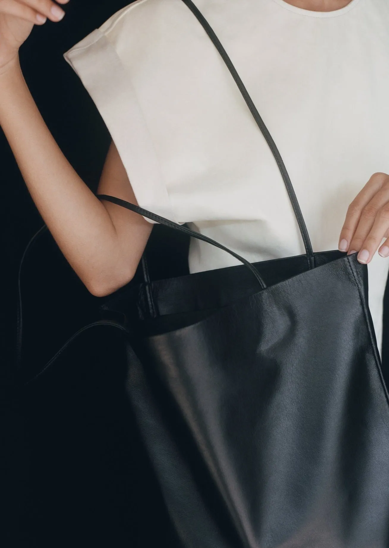 Slim Lamb Sak | Black sold by Modern Weaving