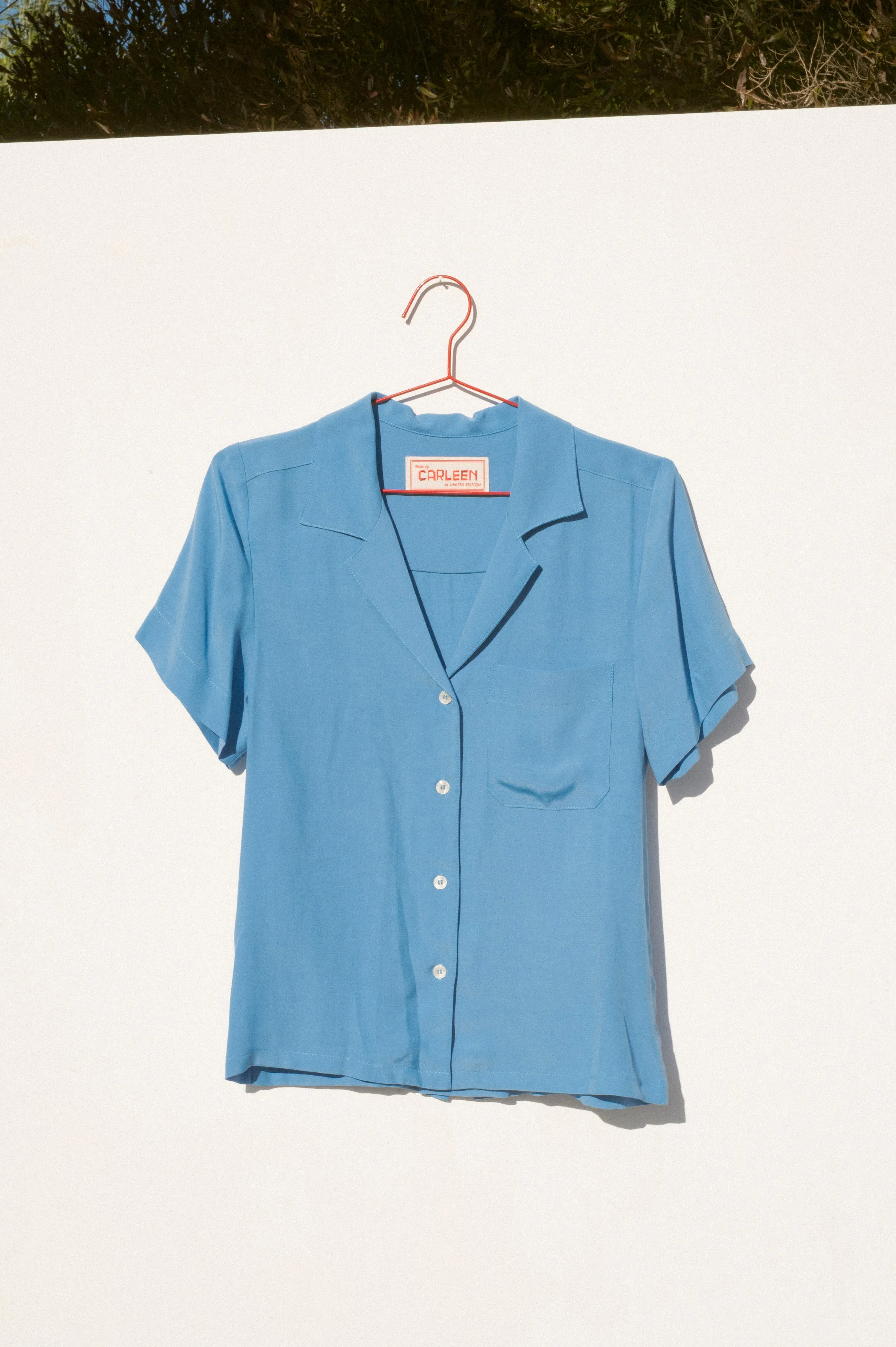 Nancy Button-Waist Shirt - Blue sold by CARLEEN