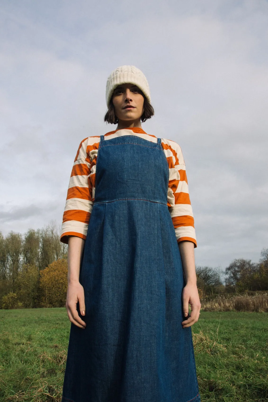 Katana-Leigh Organic Cotton Denim Pinafore Dress in Mid Blue sold by Beaumont Organic