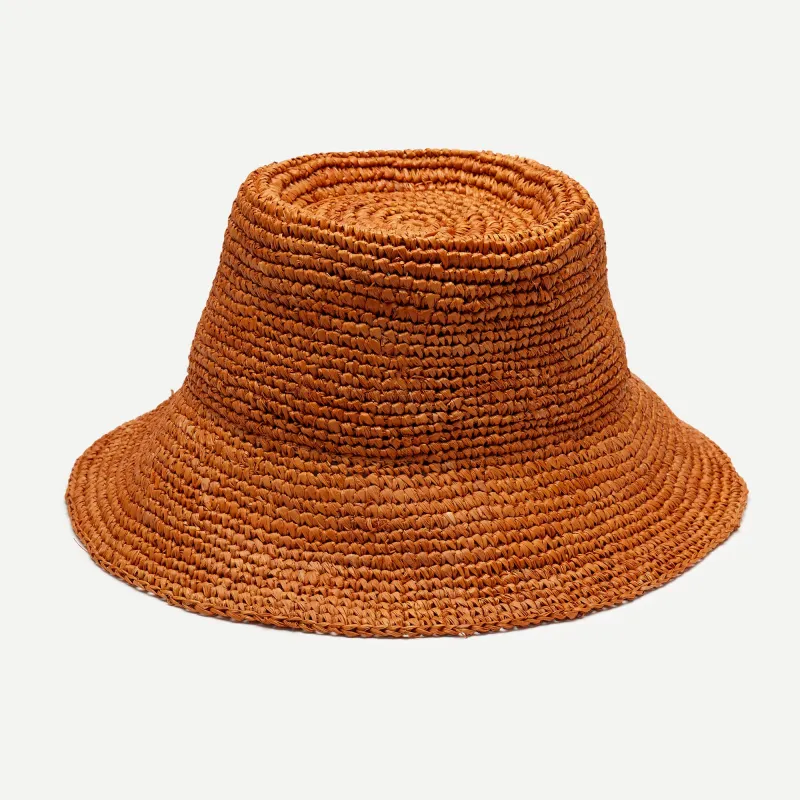 Tali Raffia Bucket in Rust sold by Wyeth