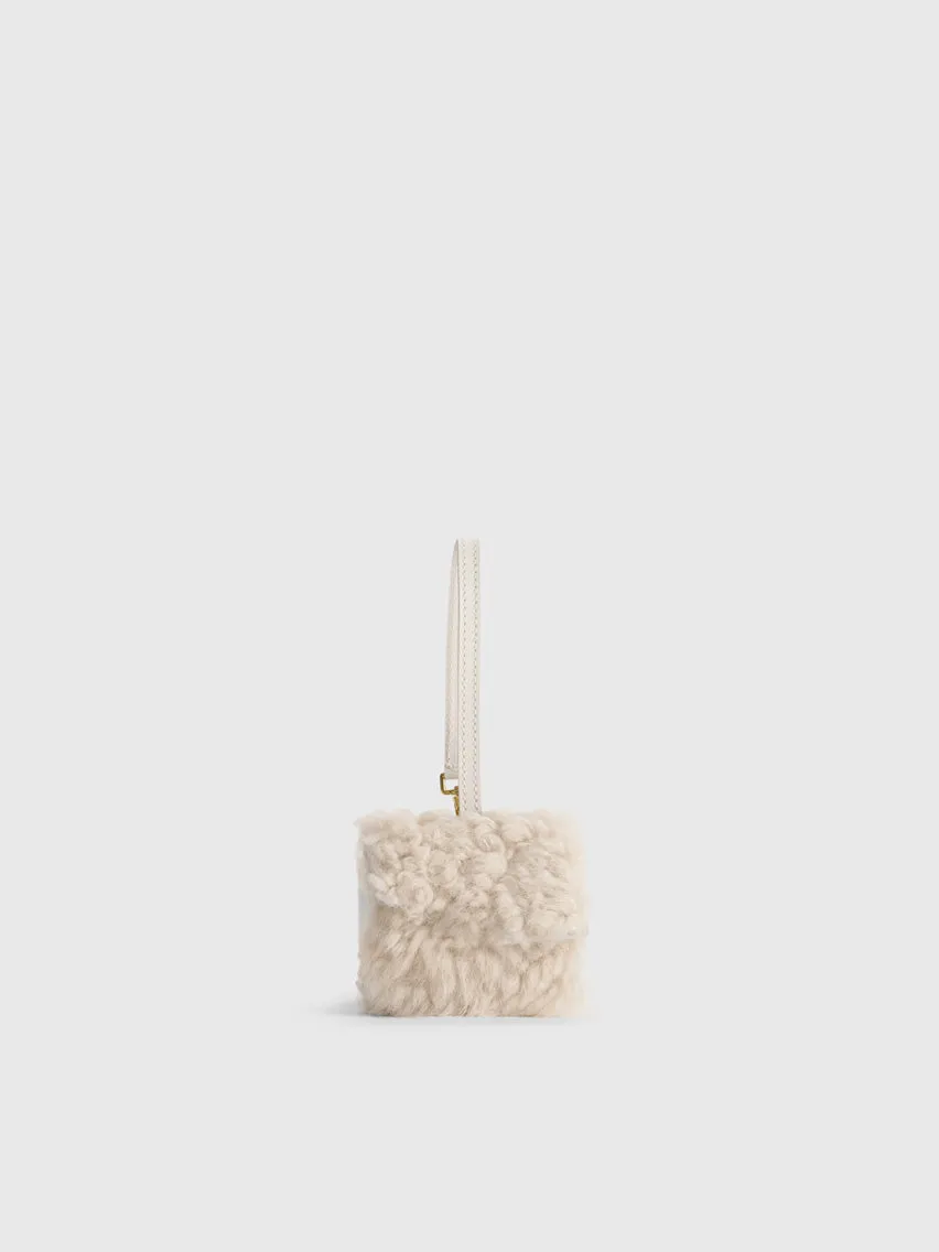 Selva Vanilla/Linen Shearling/Leather Key chain sold by ATP Atelier