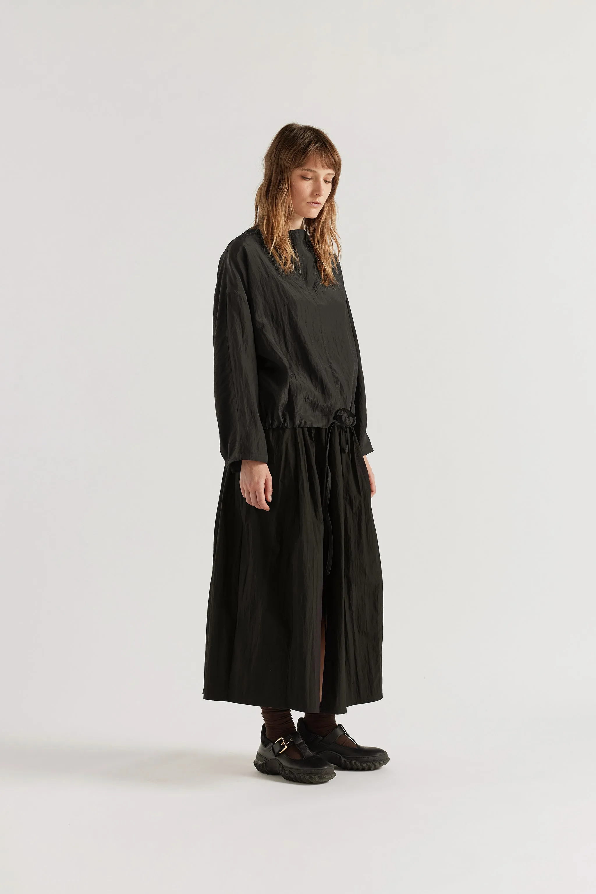 Locus Top Black sold by Kloke