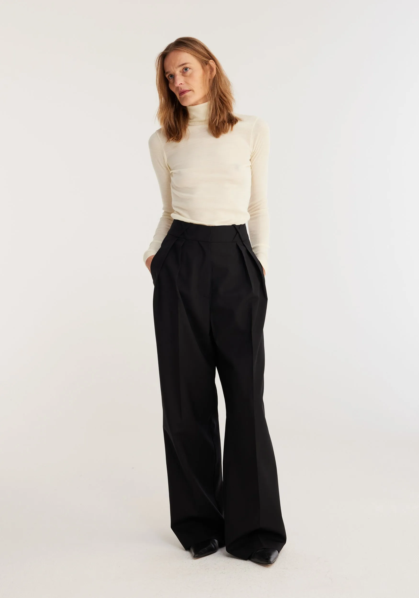 Fine merino turtleneck | off-white sold by Rohe