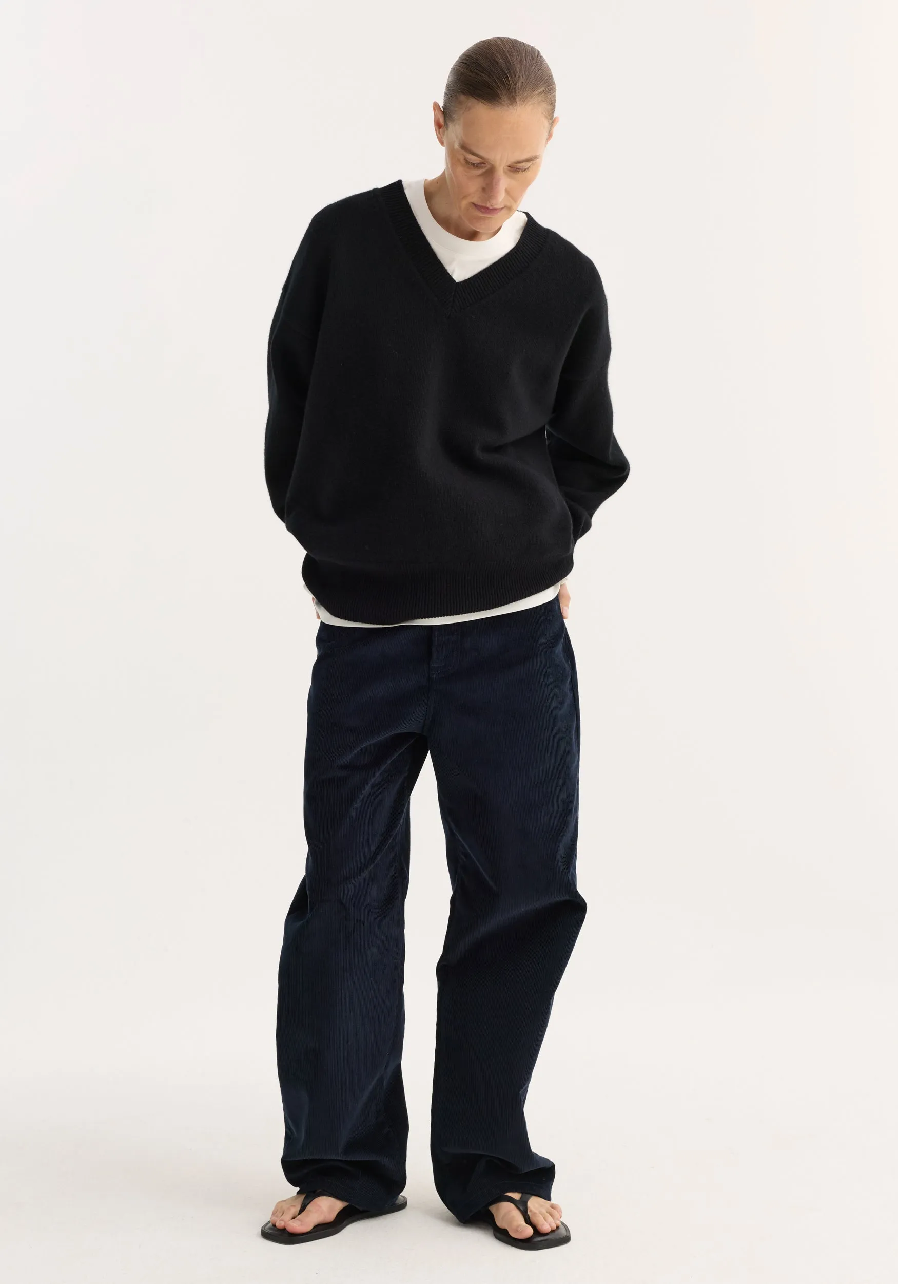 V-neck knitted jumper | black sold by Rohe