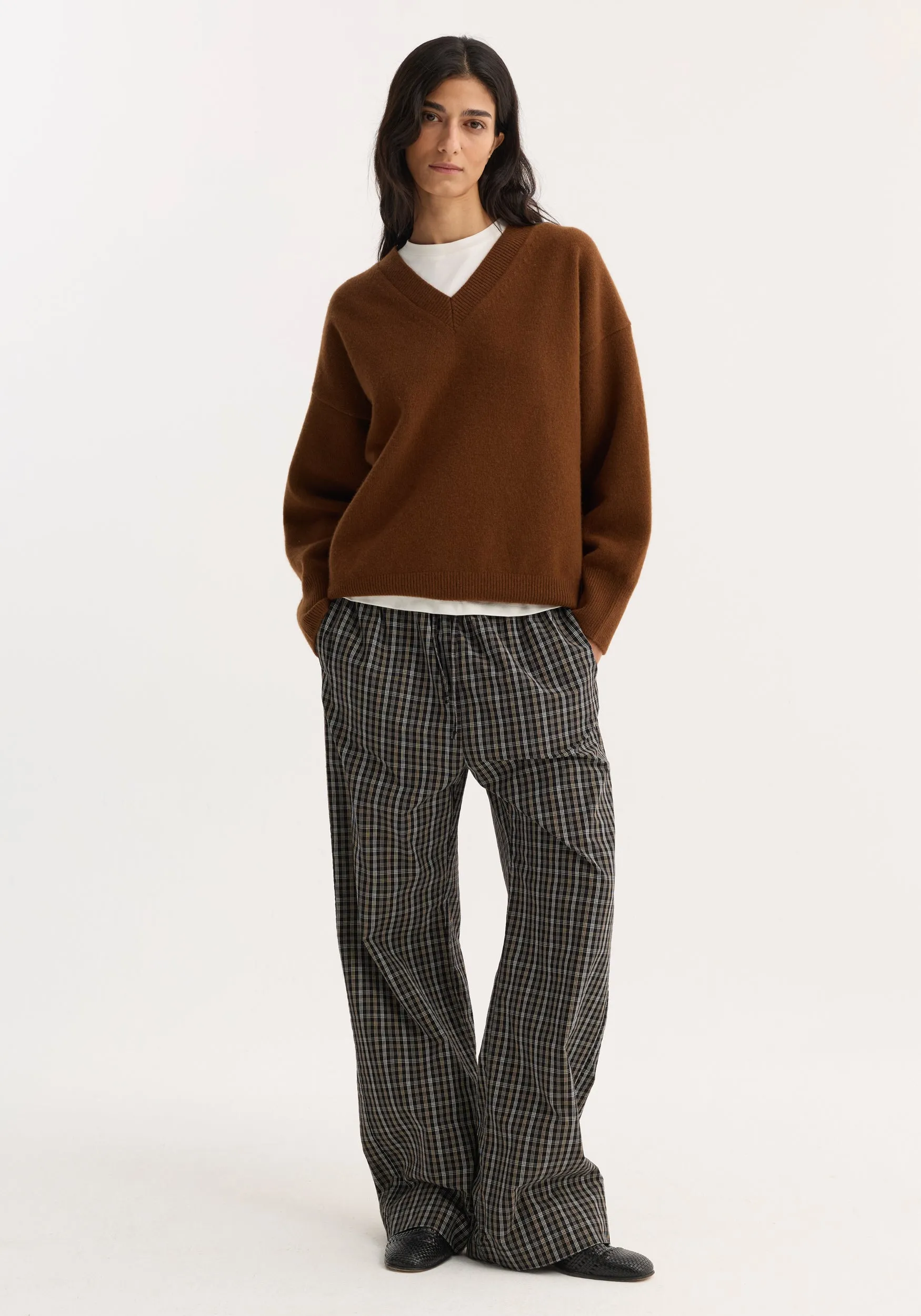Relaxed fit trousers | black / brown check sold by Rohe